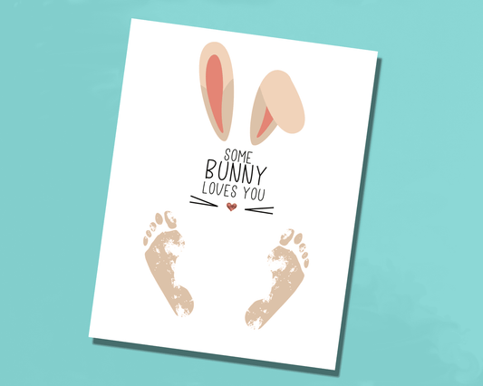 Easter footprint art featuring a bunny illustration with the phrase "Some Bunny Loves You" and space for children's footprints.