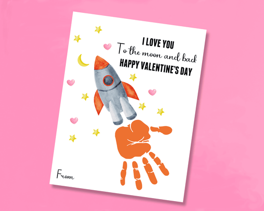 Handprint art featuring a rocket with stars and hearts, where the handprint creates the fire coming out of the rocket. Includes Happy Valentine's Day message.